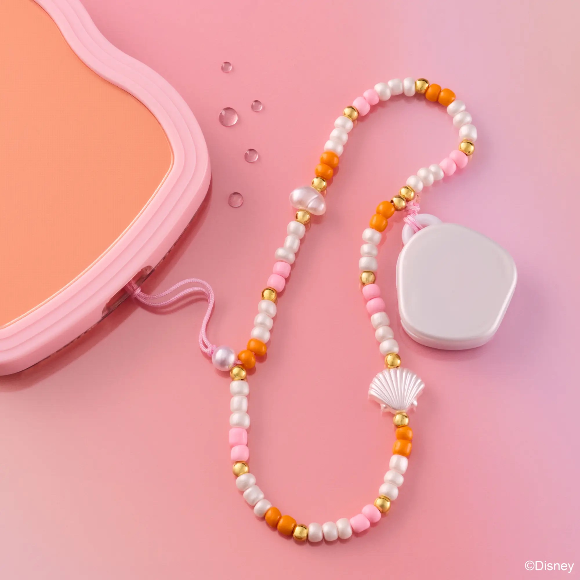 Balsamo labbra con charm per telefono Disney THE LITTLE MERMAID. - Essence - immagine 2